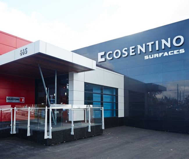 The exterior of Toronto countertop materials showroom Cosentino Surfaces is covered in black Dekton panels.