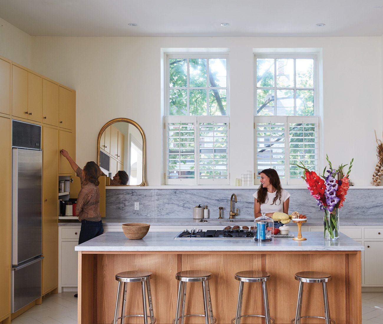 Dragonette lead singer Martina Sorbara in her kitchen with her sister Ginger.