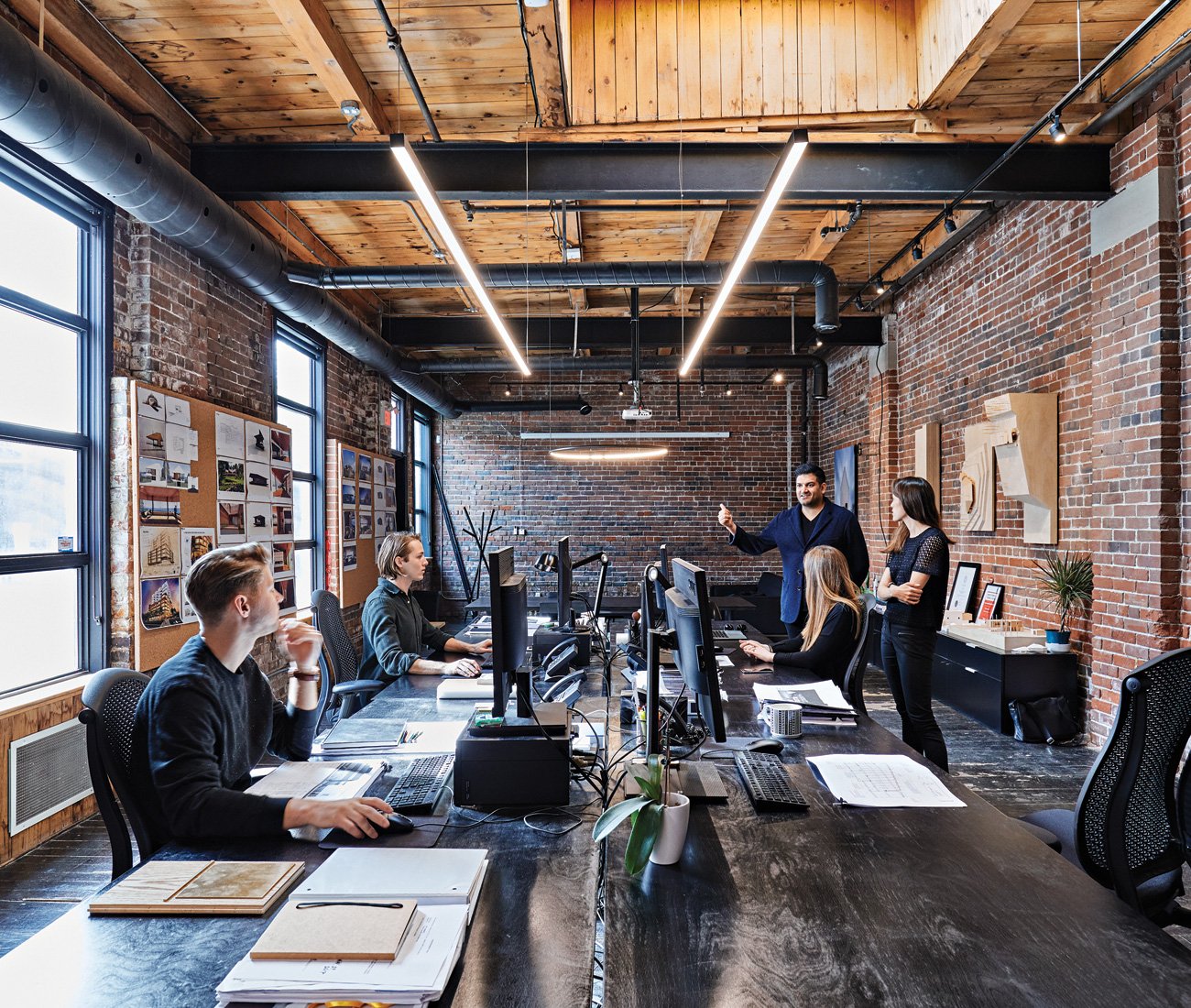 Omar Gandhi OG Architect Architect Omar Gandhi with his team in his Toronto office. OG Architects