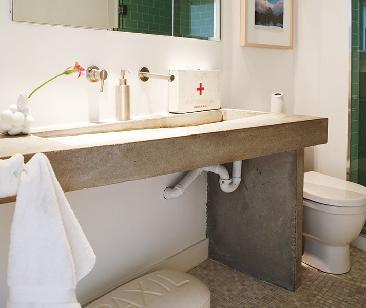 fashion district loft toronto bathroom with custom-made poured concrete vanity