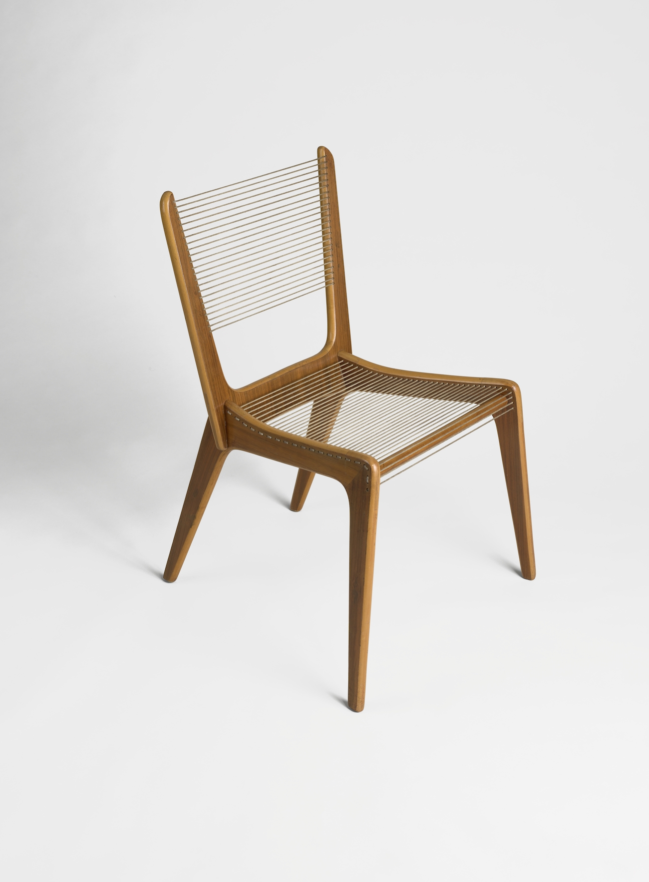Cord Chair (1952), designed by Jacques Guillon